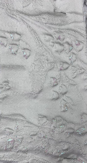 فستان رسمي طويل وتصميم أنيق. مصنوع من البروكاد. 